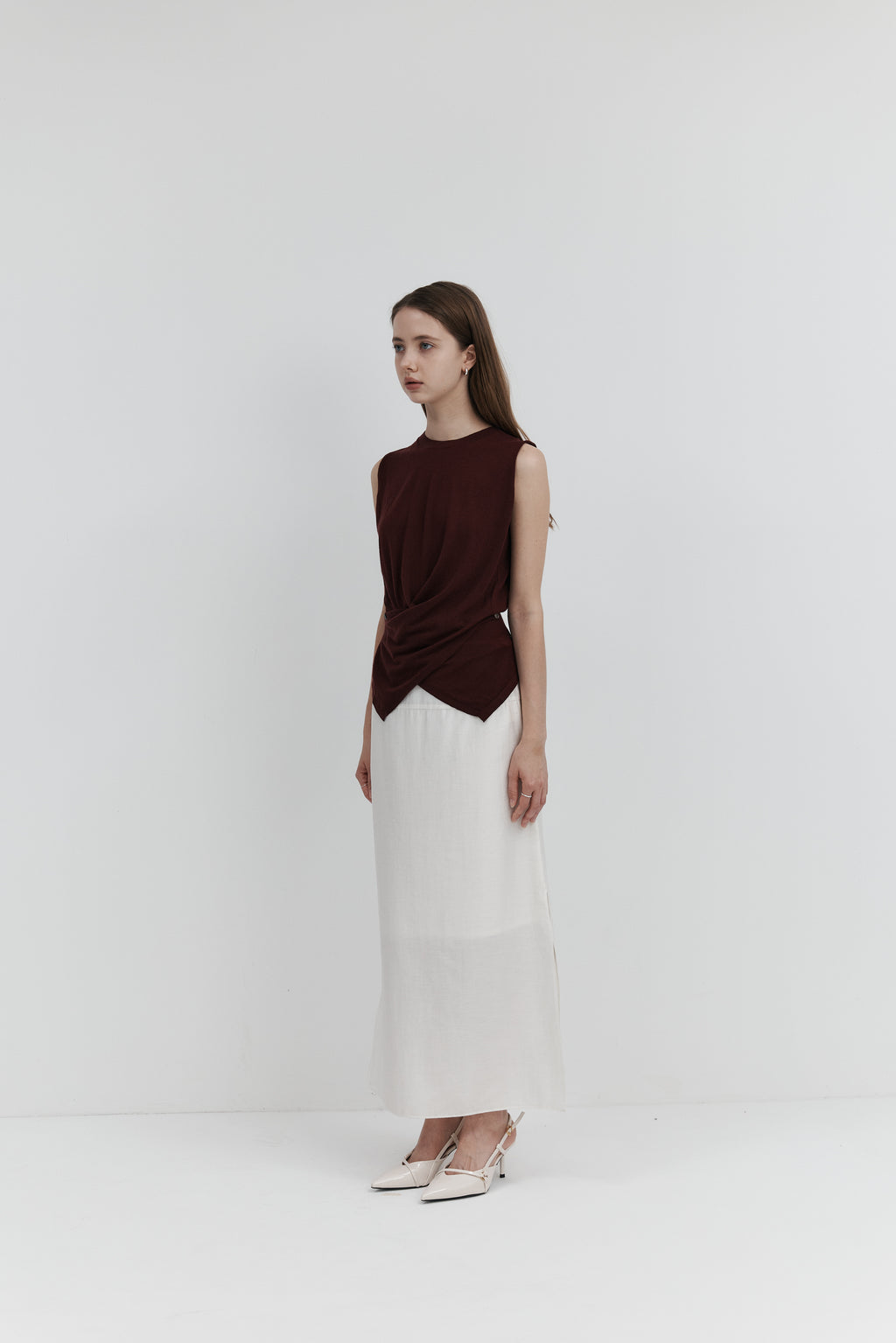 울 셔링 슬리브리스 니트