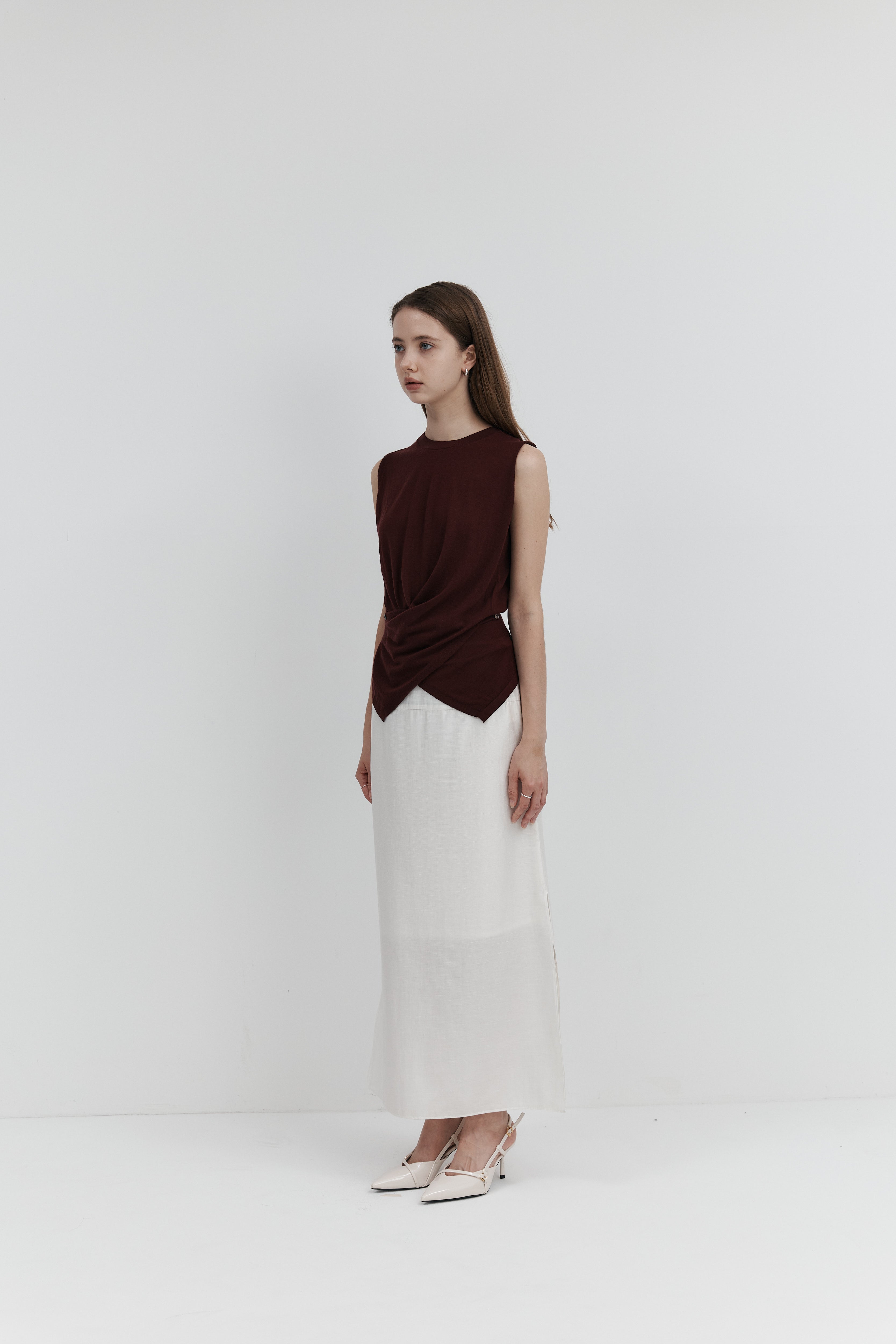 울 셔링 슬리브리스 니트