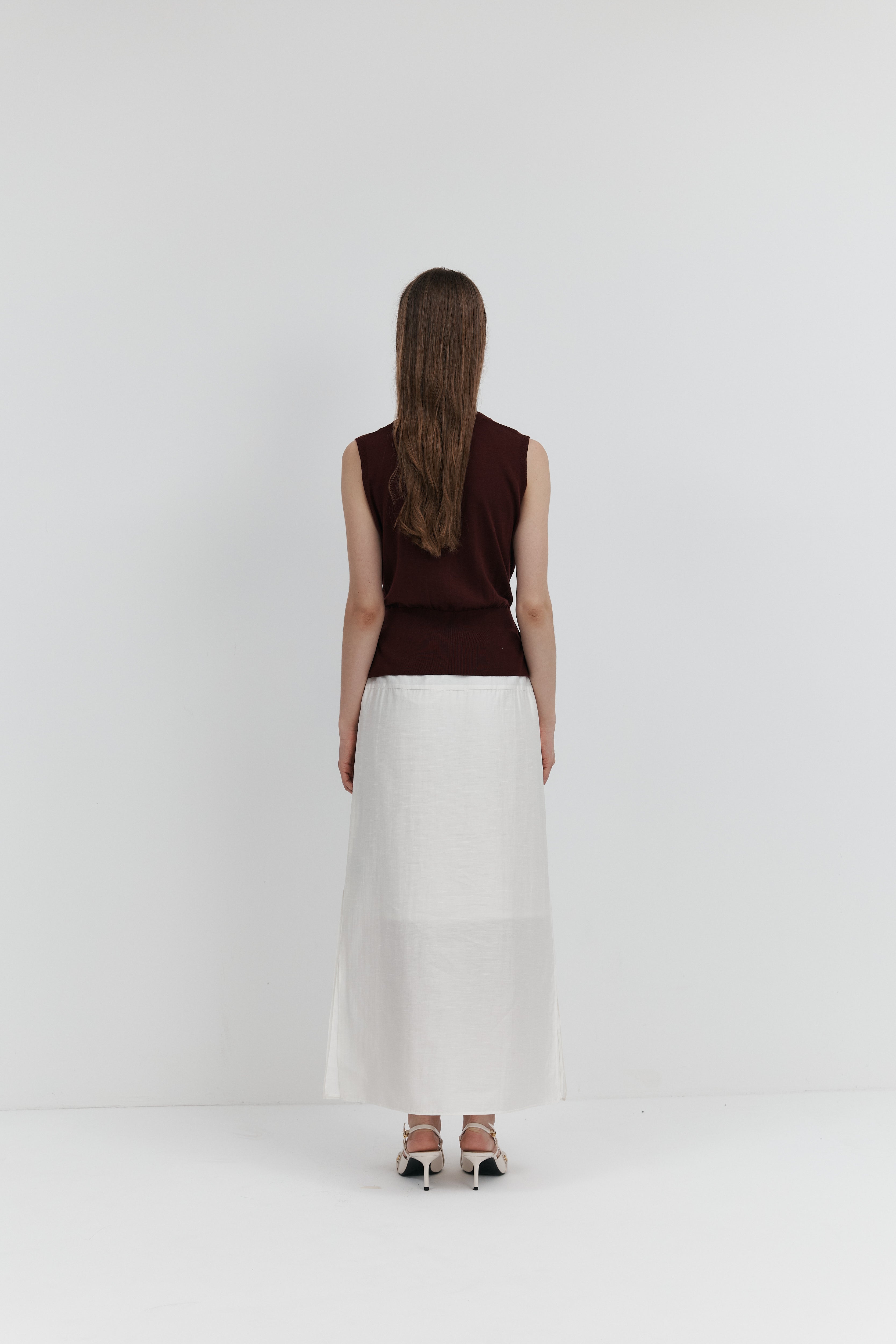 울 셔링 슬리브리스 니트