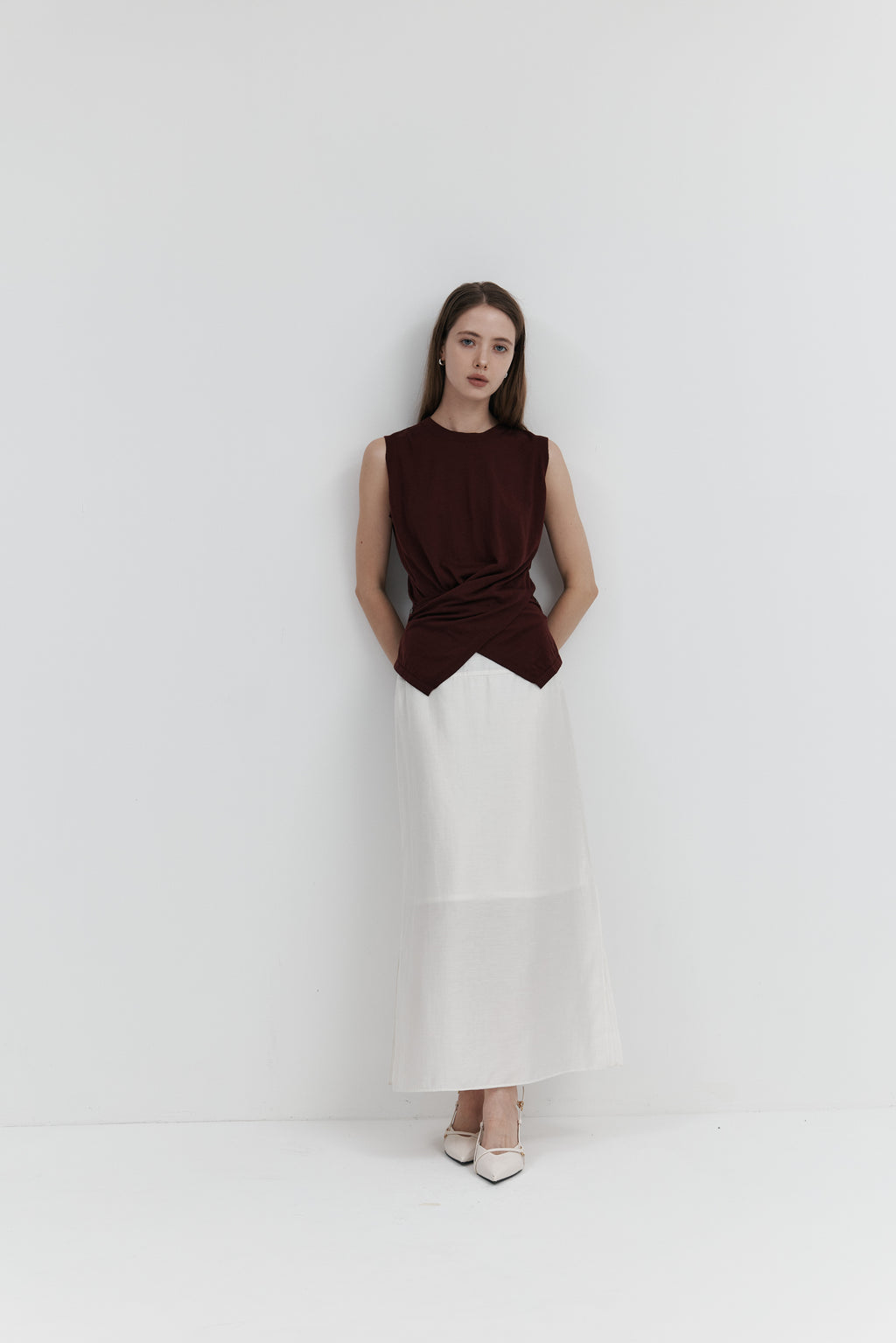 울 셔링 슬리브리스 니트