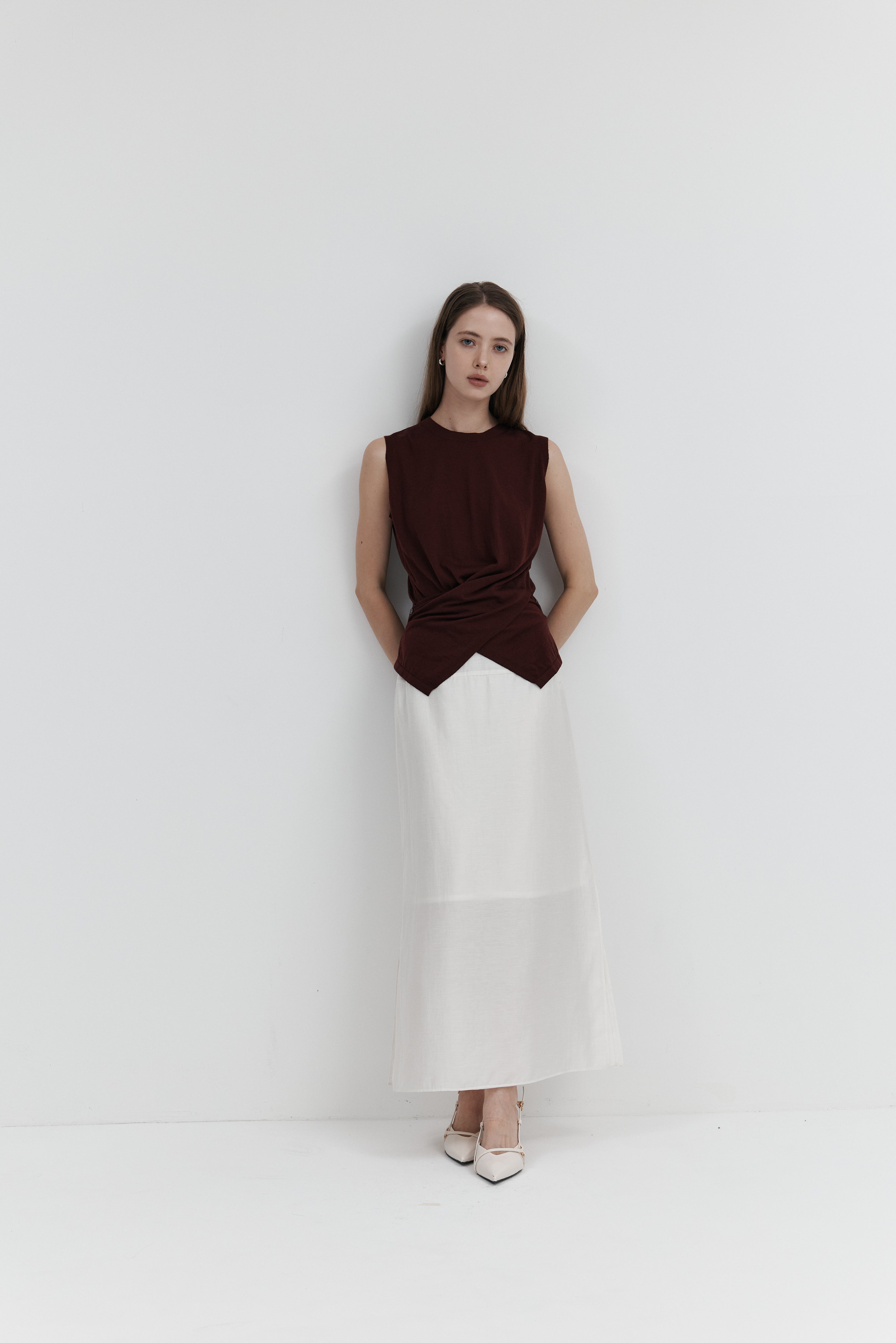 울 셔링 슬리브리스 니트