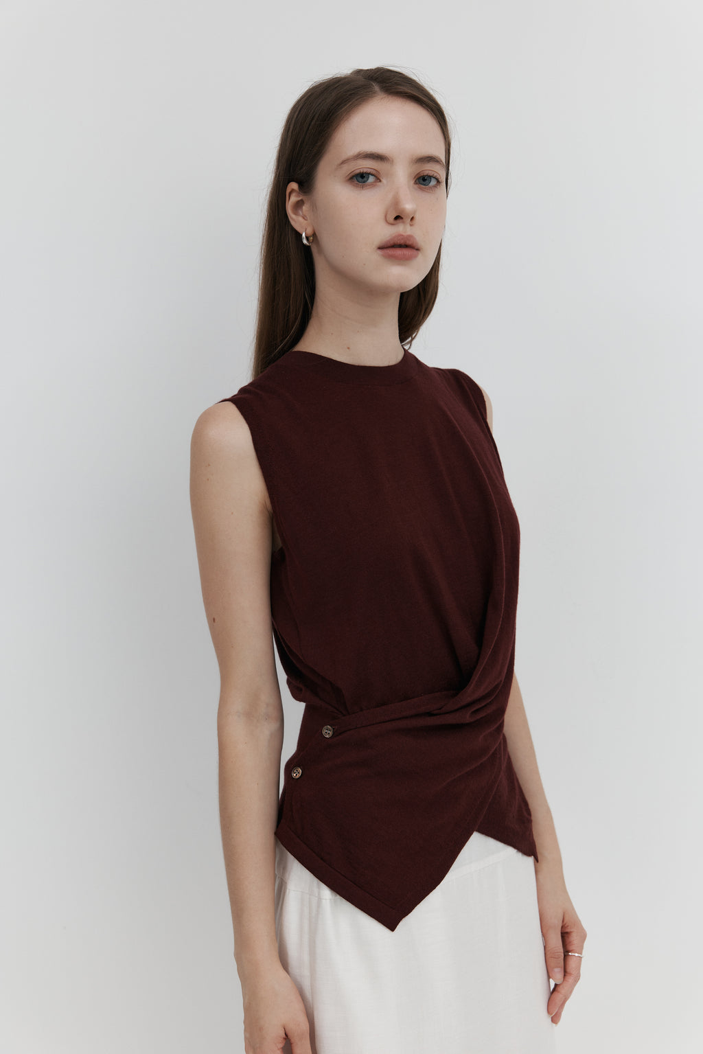 울 셔링 슬리브리스 니트